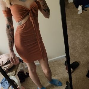 Small coral off the shoulder cut out dress